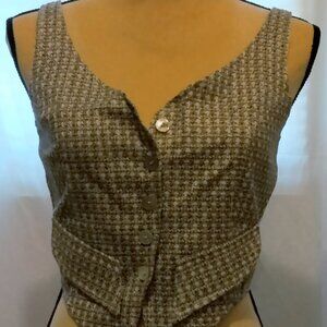 Brown and tan hounds-tooth lined vest.